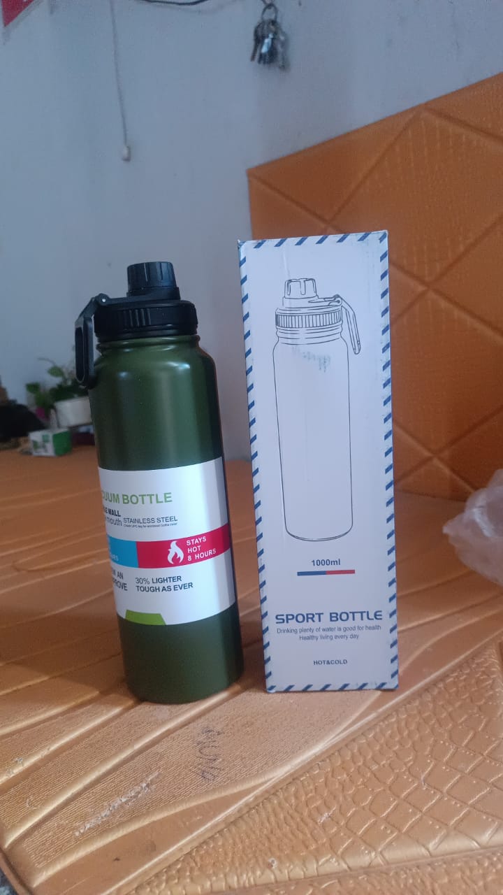 Stainless Steel Double Wall Vacuum-Insulated Drink Water Bottle (1000 ML / Mix Color) Stainless Steel Double Wall Vacuum-Insulated Drink Water Bottle (1000 ML / Mix Color)